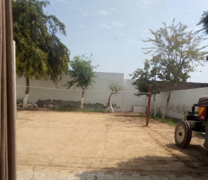 Outdoor courtyard and activity area at Sunehari Devi Girls Library